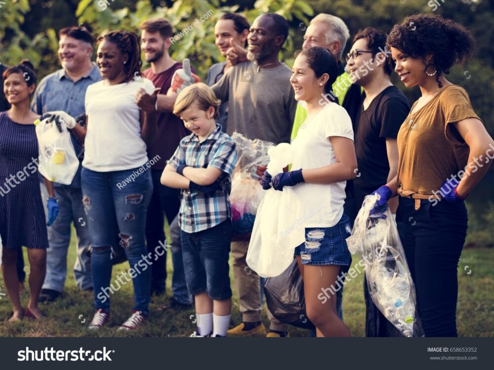 stockphotodiversegroupofpeoplepickuptrashintheparkvolunteer